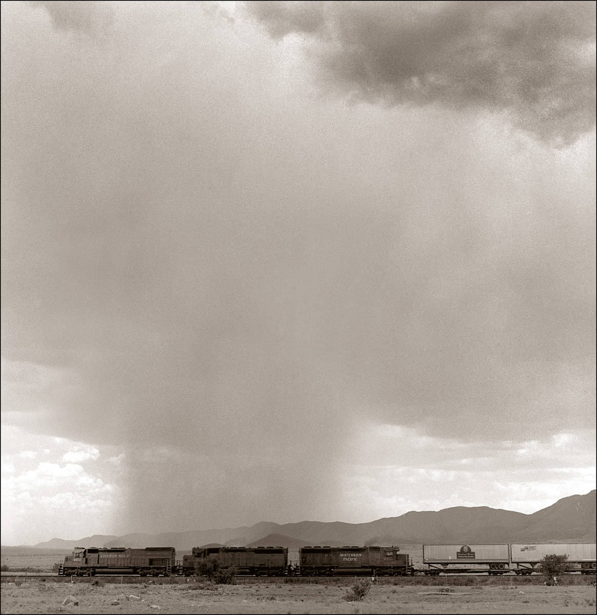 Train and Isolated Rain_© James H. Evans